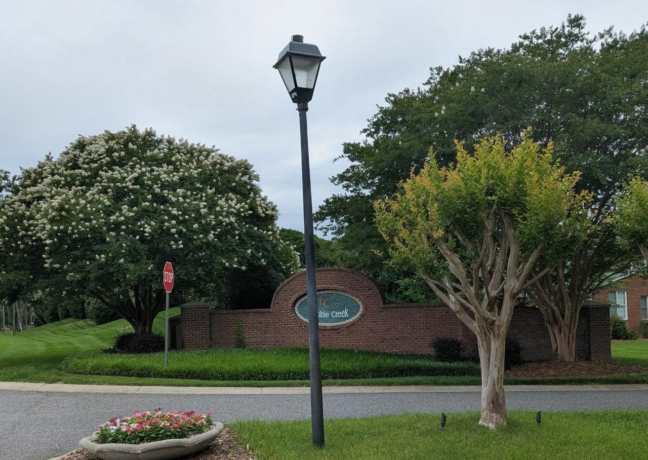 Pebble Creek entrance sign detail